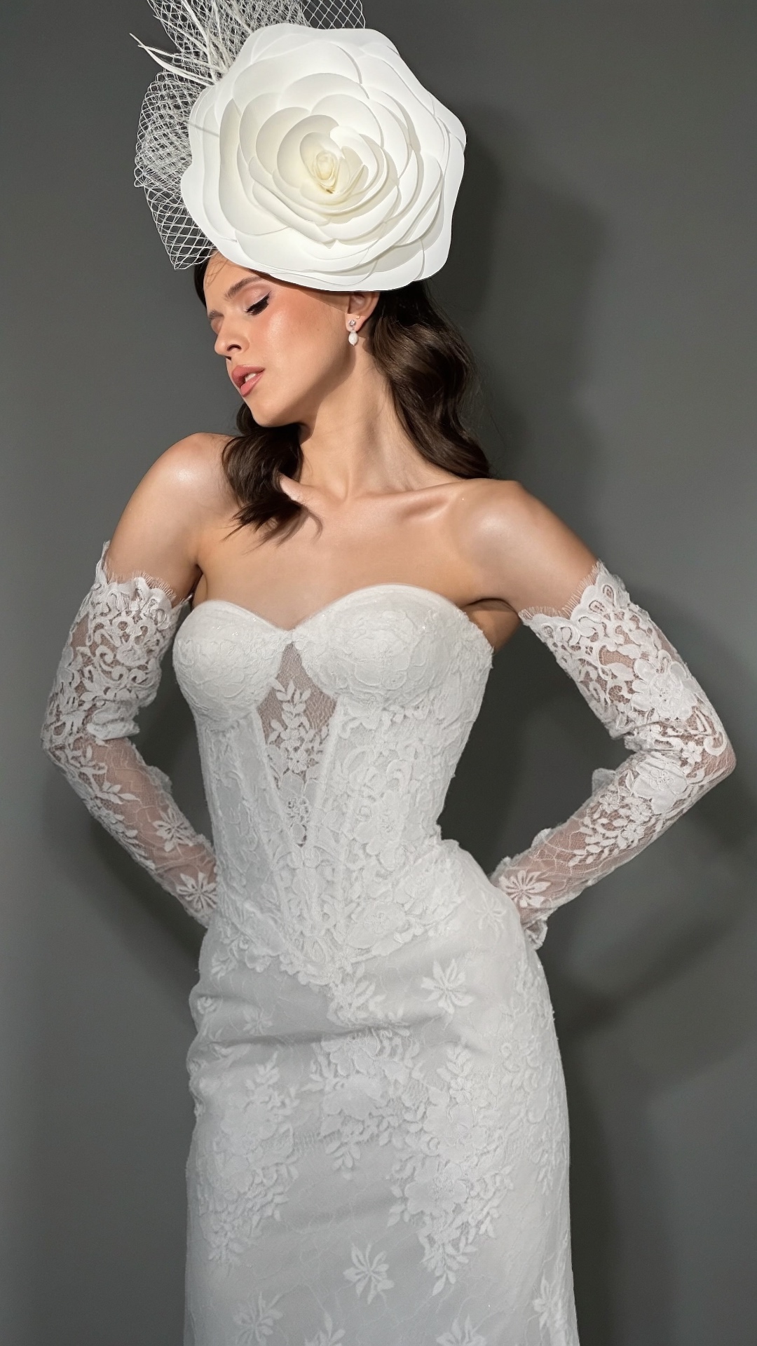 LEMAKS bridal — handcrafted lace gown with floral fascinator